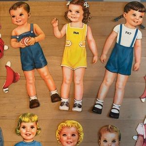 Vintage Paper Dolls with tons of outfits!